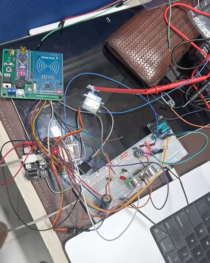 The prototype’s breadboard, development board and RFID reader